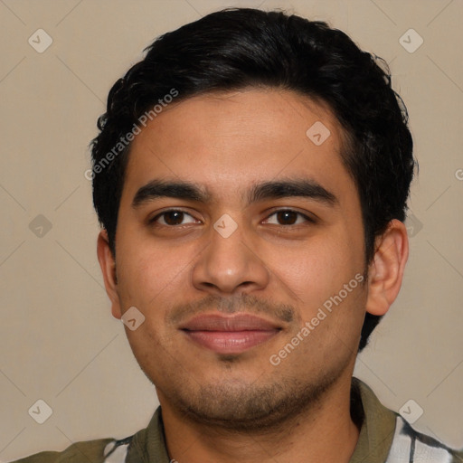 Joyful latino young-adult male with short  black hair and brown eyes