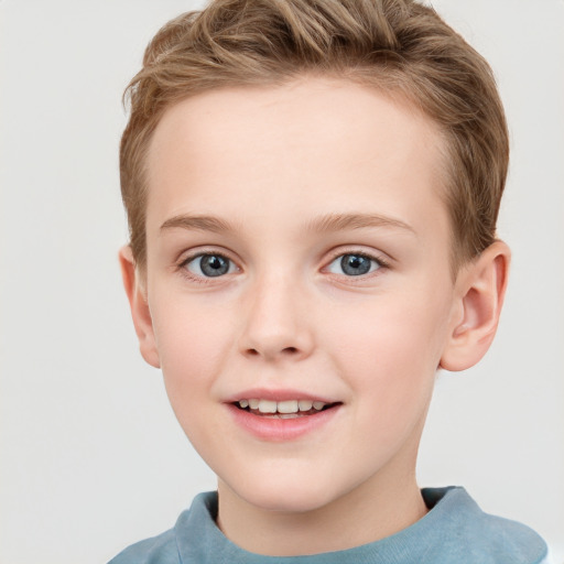 Joyful white child female with short  brown hair and grey eyes