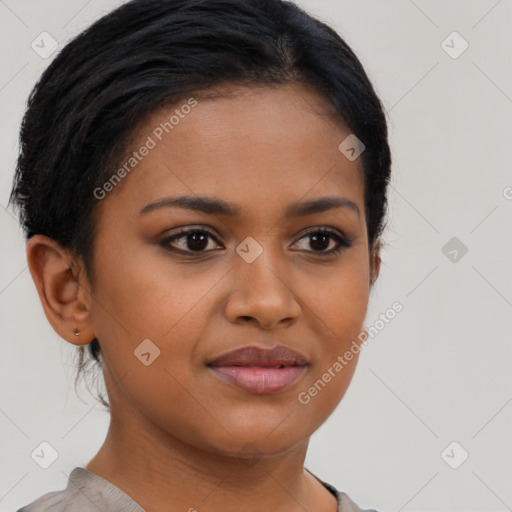 Joyful latino young-adult female with short  brown hair and brown eyes