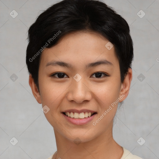 Joyful asian young-adult female with short  black hair and brown eyes