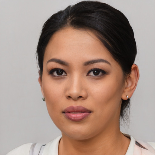 Neutral asian young-adult female with medium  black hair and brown eyes