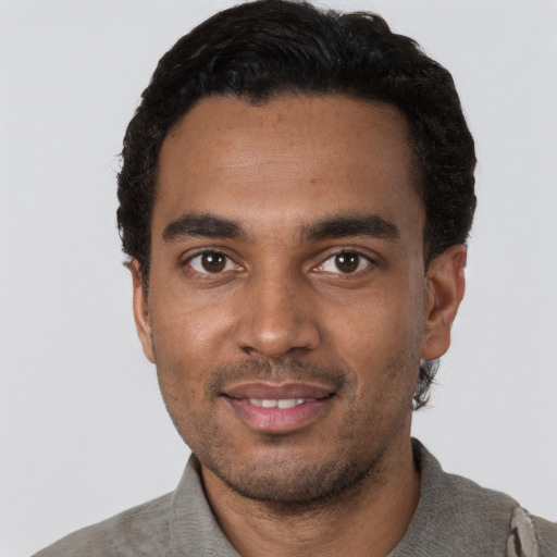 Neutral black young-adult male with short  black hair and brown eyes