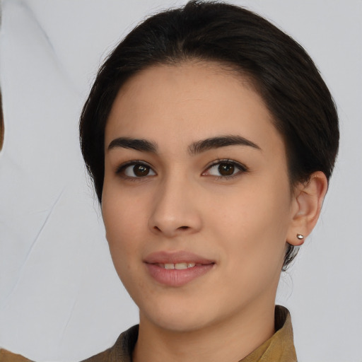 Joyful white young-adult female with medium  black hair and brown eyes