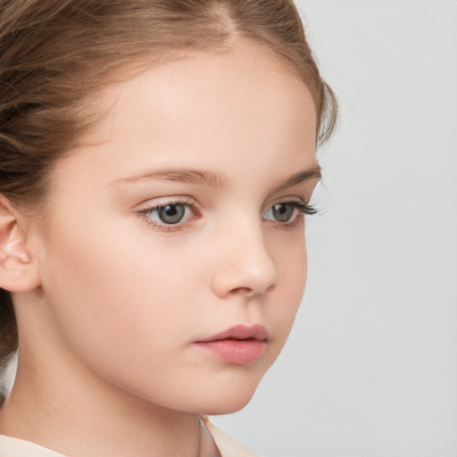 Neutral white child female with medium  brown hair and blue eyes