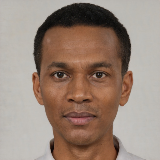 Neutral black young-adult male with short  black hair and brown eyes