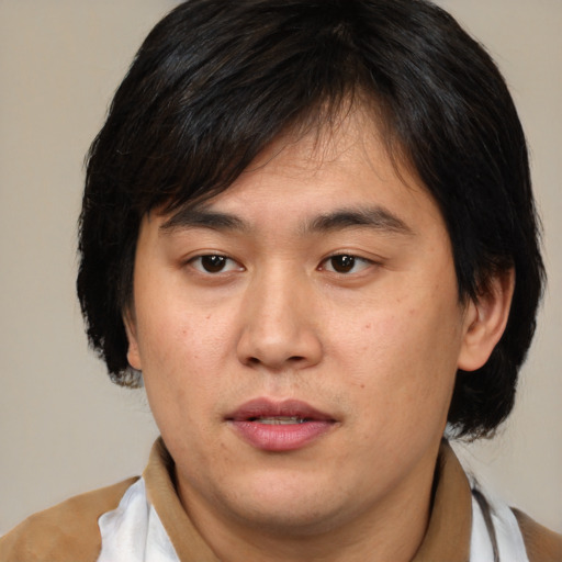 Neutral asian young-adult male with medium  brown hair and brown eyes