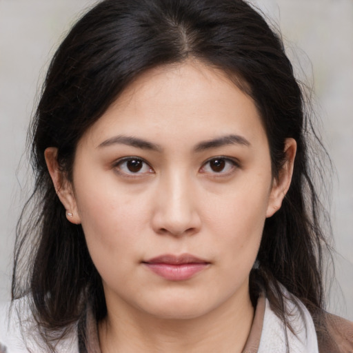 Neutral asian young-adult female with medium  brown hair and brown eyes