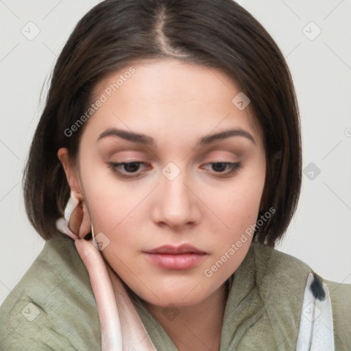 Neutral white young-adult female with medium  brown hair and brown eyes