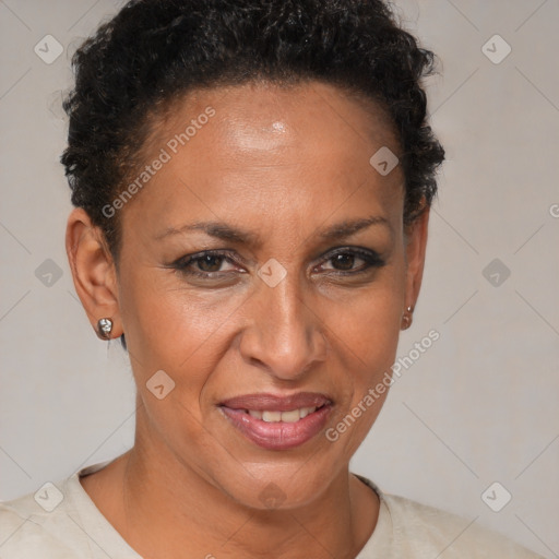 Joyful black adult female with short  brown hair and brown eyes