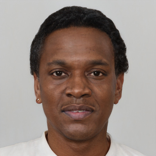 Neutral black adult male with short  black hair and brown eyes