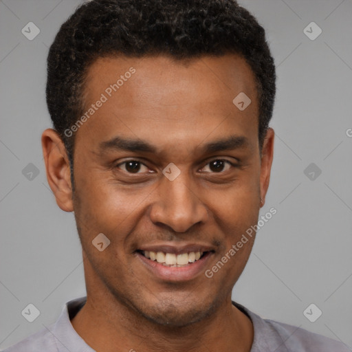 Joyful latino young-adult male with short  brown hair and brown eyes
