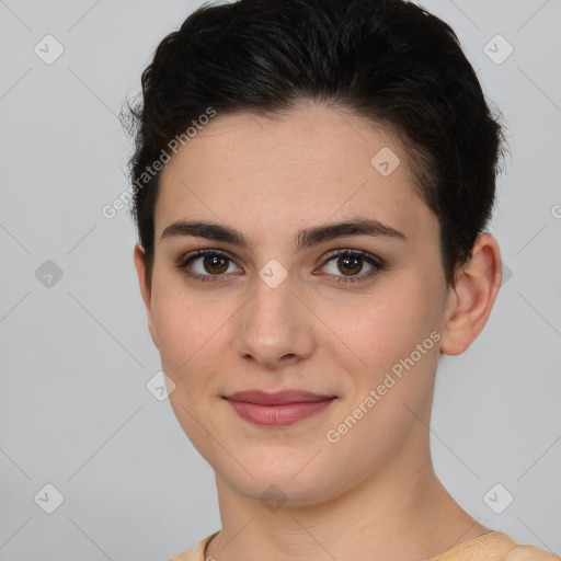 Joyful white young-adult female with short  brown hair and brown eyes