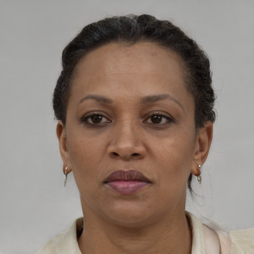 Neutral black adult female with short  brown hair and brown eyes