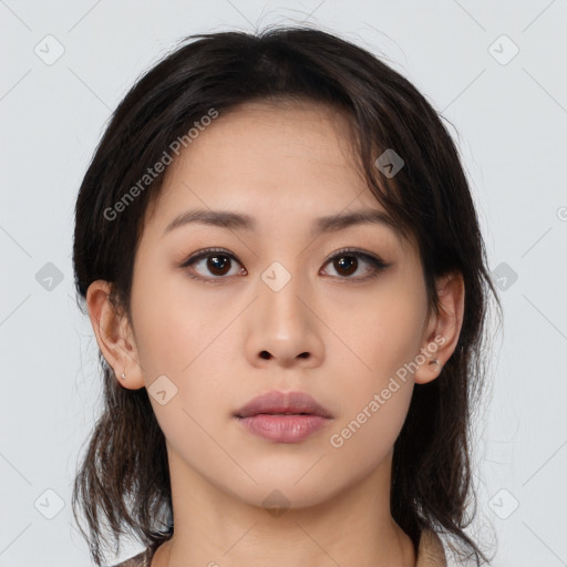 Neutral asian young-adult female with medium  brown hair and brown eyes