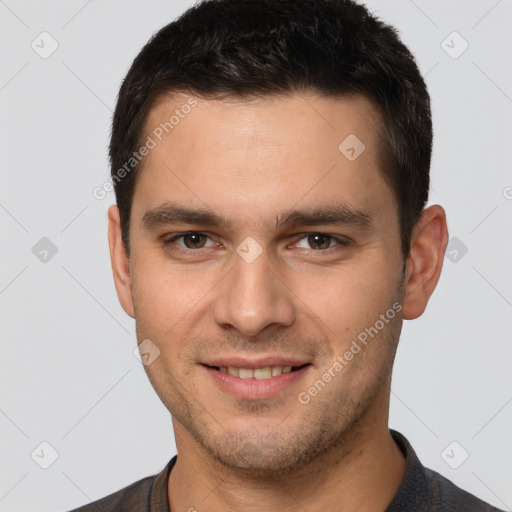 Joyful white young-adult male with short  brown hair and brown eyes