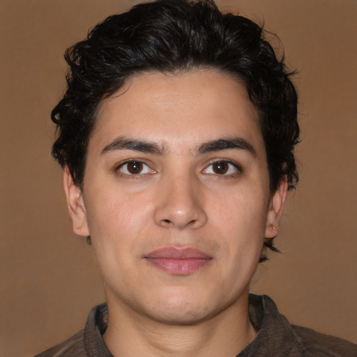 Joyful white young-adult male with medium  brown hair and brown eyes