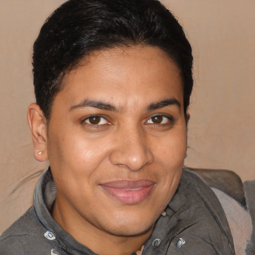 Joyful latino young-adult male with short  brown hair and brown eyes