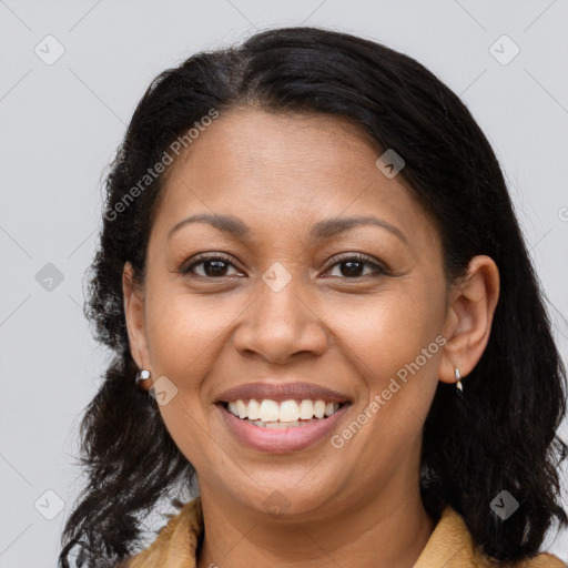 Joyful latino young-adult female with long  brown hair and brown eyes