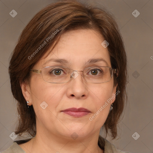 Joyful white adult female with medium  brown hair and grey eyes