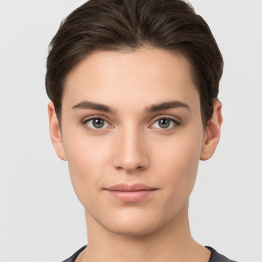 Neutral white young-adult female with short  brown hair and brown eyes