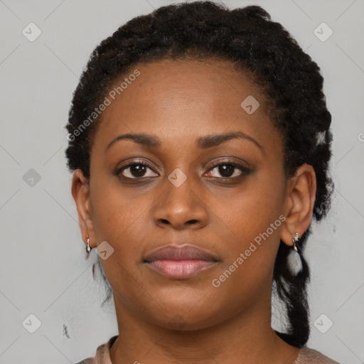 Neutral black young-adult female with short  brown hair and brown eyes