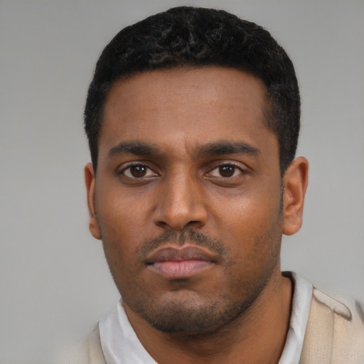 Neutral latino young-adult male with short  black hair and brown eyes