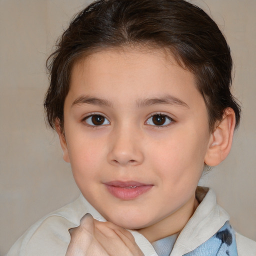 Joyful white child female with medium  brown hair and brown eyes