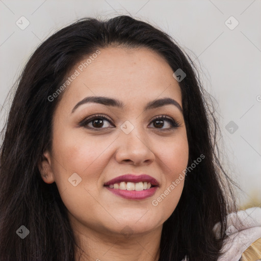 Joyful latino young-adult female with long  brown hair and brown eyes