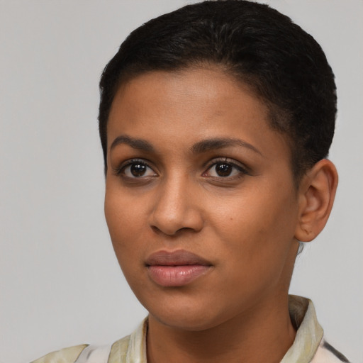 Joyful latino young-adult female with short  brown hair and brown eyes