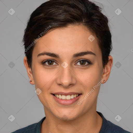 Joyful white young-adult female with short  brown hair and brown eyes