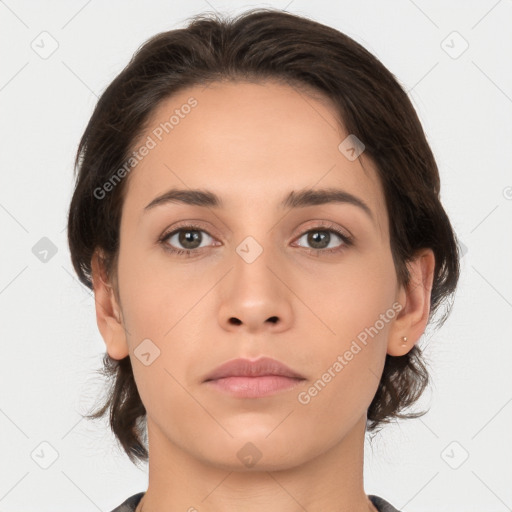 Neutral white young-adult female with medium  brown hair and brown eyes