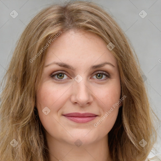 Joyful white young-adult female with long  brown hair and green eyes