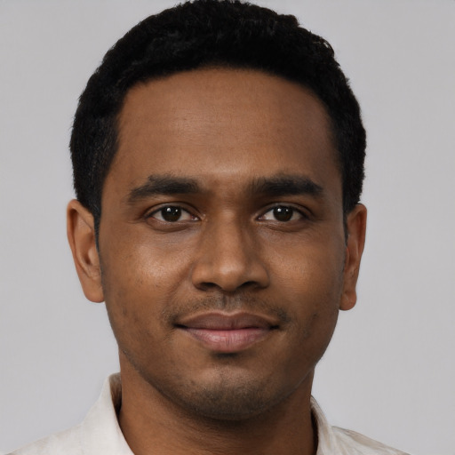Neutral black young-adult male with short  black hair and brown eyes