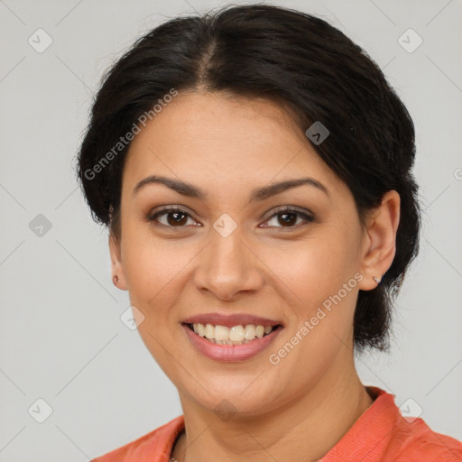 Joyful latino young-adult female with medium  brown hair and brown eyes