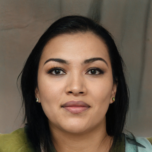 Joyful asian young-adult female with long  black hair and brown eyes