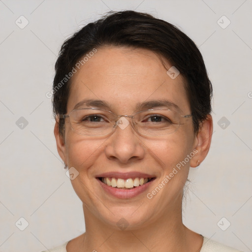 Joyful white adult female with short  brown hair and brown eyes