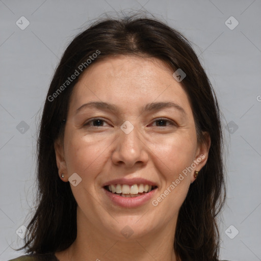 Joyful white adult female with medium  brown hair and brown eyes