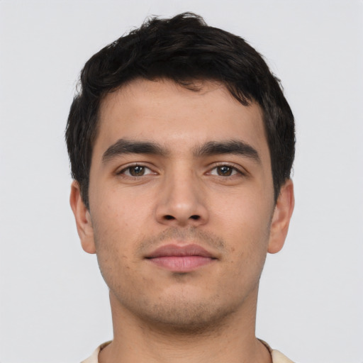Neutral asian young-adult male with short  brown hair and brown eyes