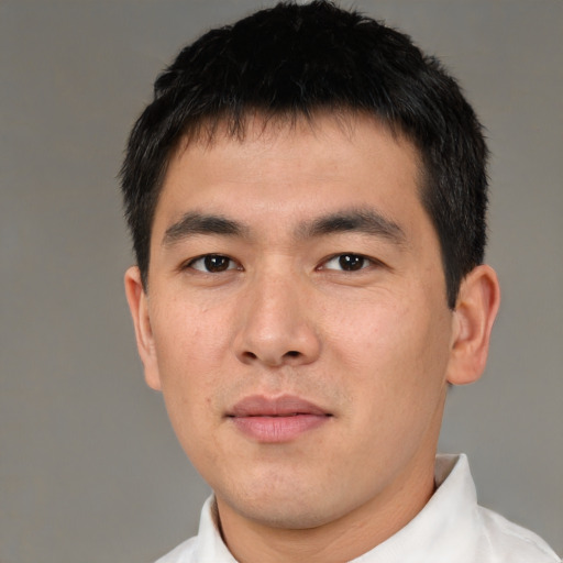 Neutral asian young-adult male with short  brown hair and brown eyes