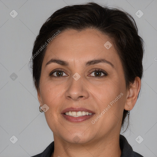 Joyful white adult female with medium  brown hair and brown eyes