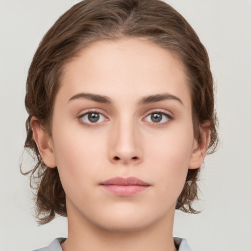 Neutral white young-adult female with medium  brown hair and brown eyes