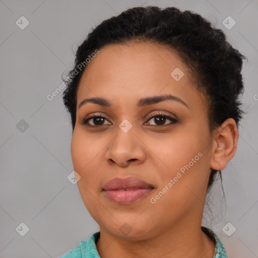 Joyful latino young-adult female with short  brown hair and brown eyes