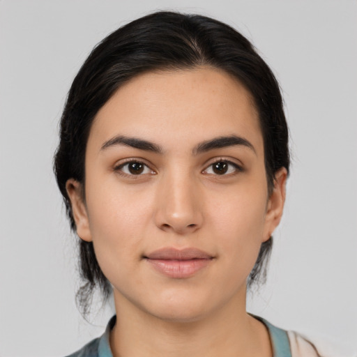 Neutral latino young-adult female with medium  black hair and brown eyes