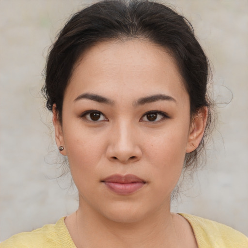 Neutral asian young-adult female with medium  brown hair and brown eyes