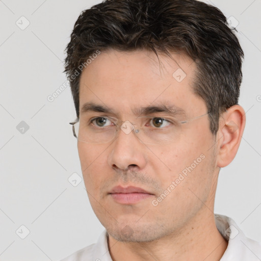 Neutral white adult male with short  brown hair and brown eyes