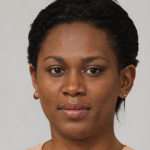Neutral black young-adult female with short  brown hair and brown eyes