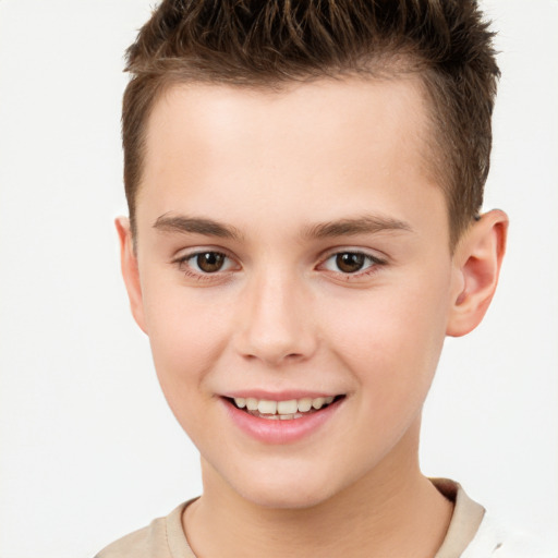 Joyful white child male with short  brown hair and brown eyes