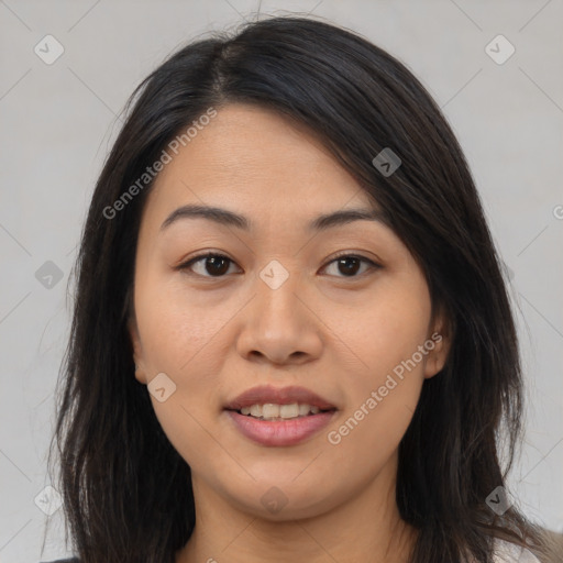 Joyful latino young-adult female with long  brown hair and brown eyes