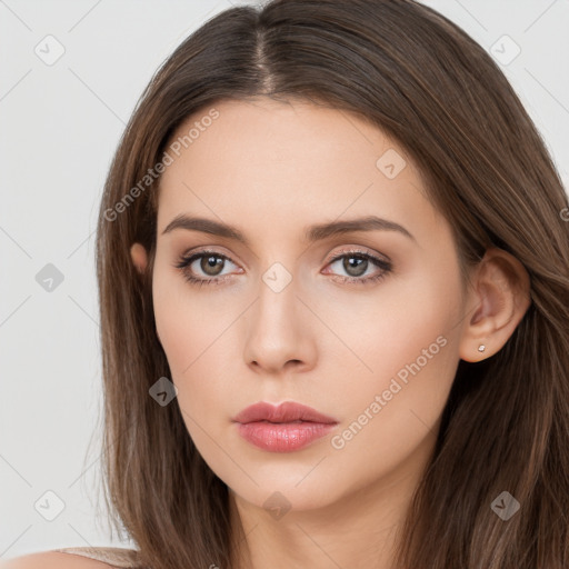 Neutral white young-adult female with long  brown hair and brown eyes