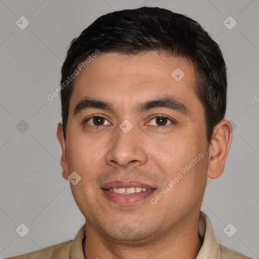 Joyful white young-adult male with short  black hair and brown eyes